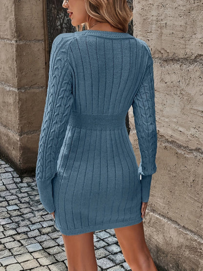 Demi — Kabelgebreide sweaterjurk
