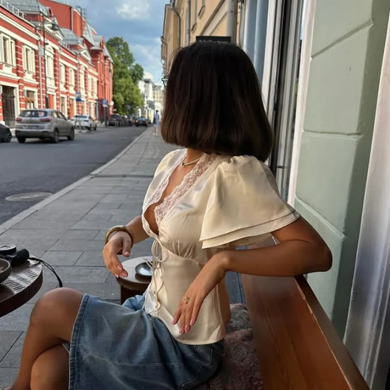 Nina — Satijnen top